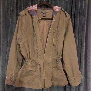 Jacket is green, comfy, and losses